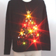 Illustration for article titled 8 Awesome* Teched-Out Christmas Sweaters